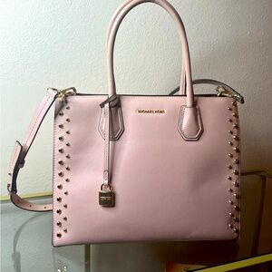 Baby pink, Michael Kors satchel with gold features.